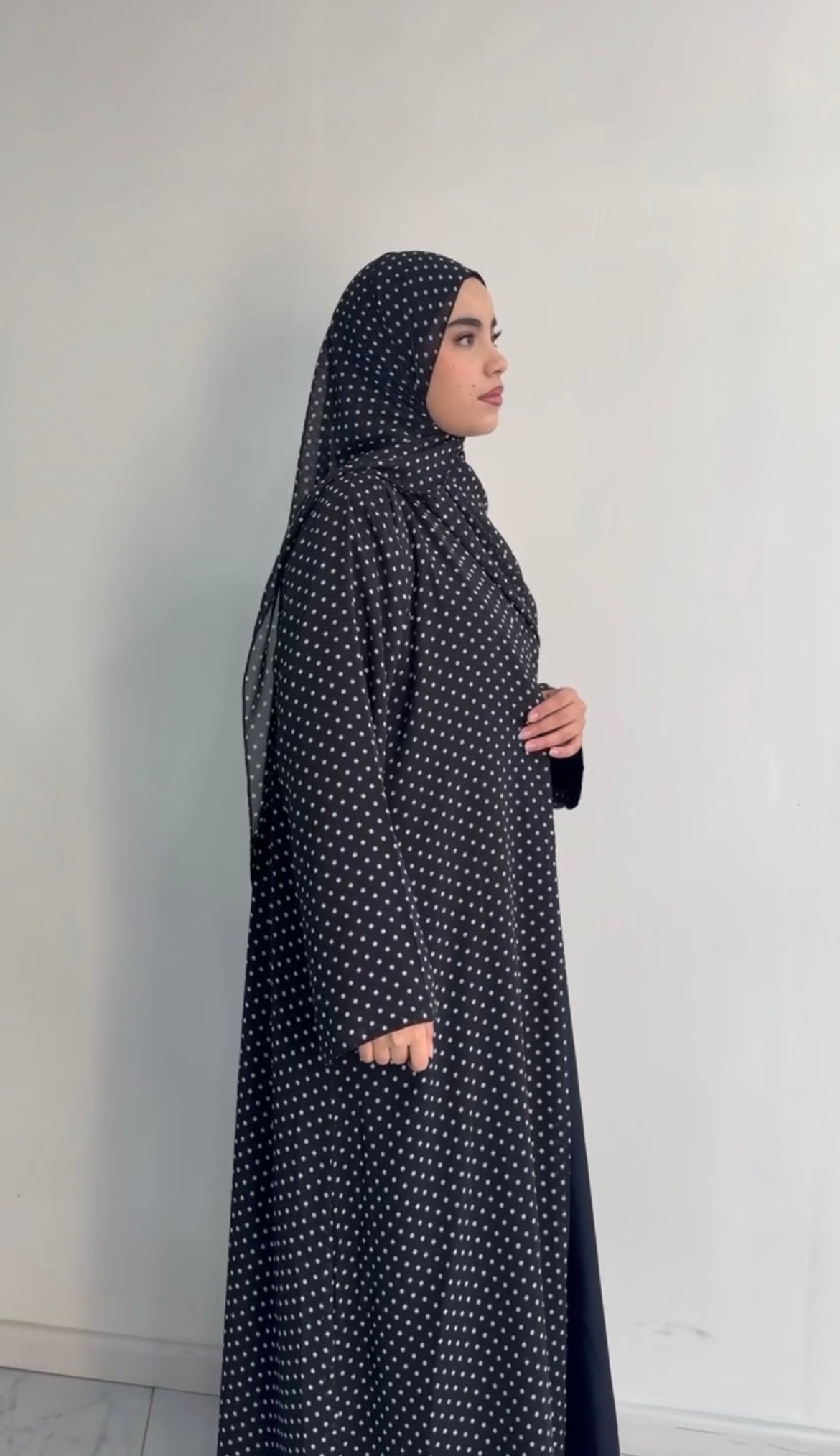 Black and white polka dot abaya